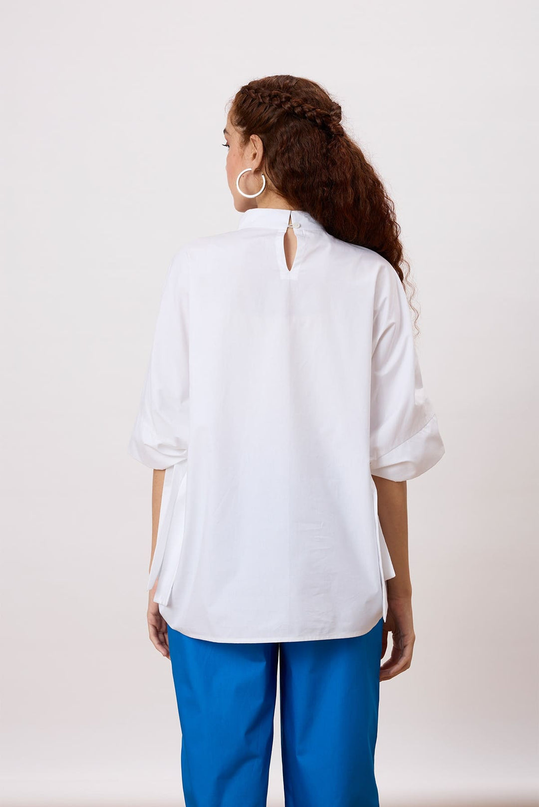 Hayden Applique Top A dolman sleeve top with tie details at the ends
