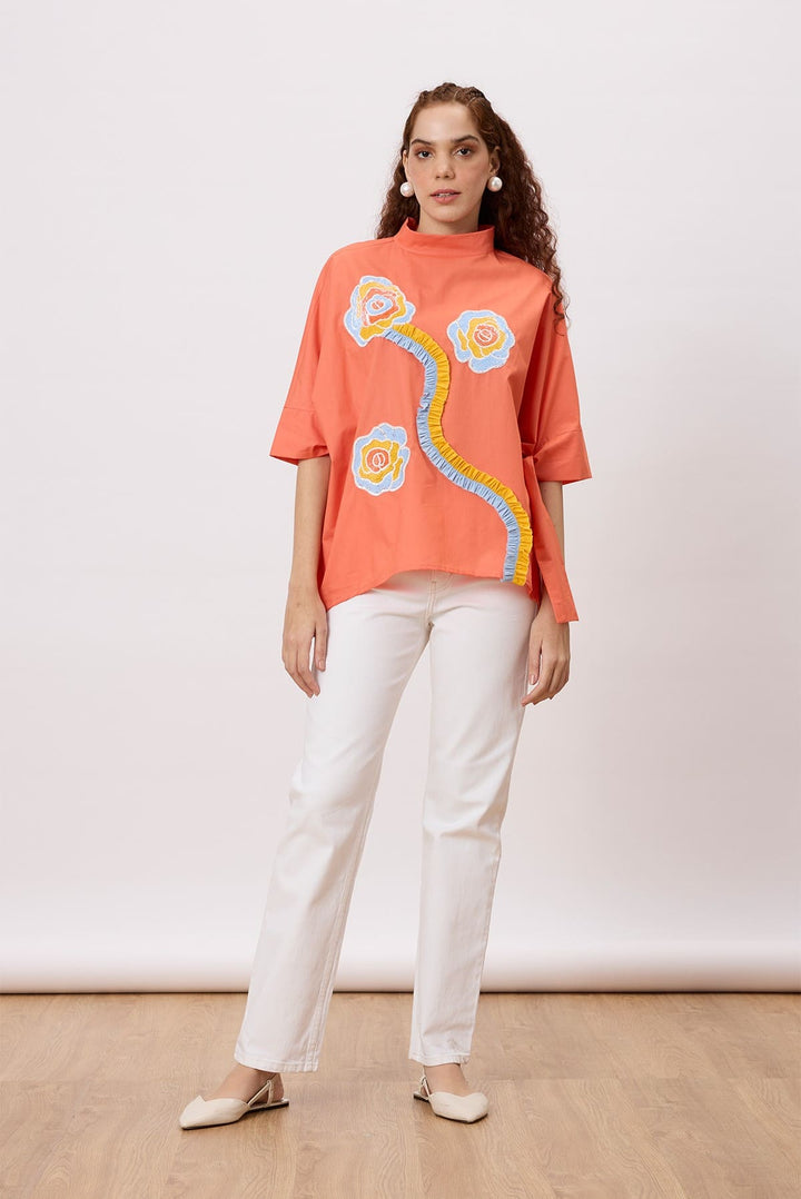 Hayden Applique Top A dolman sleeve top with tie details at the ends