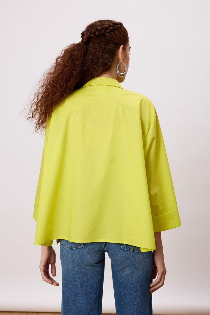 Anne Applique Shirt A chic rendition of a classic button-down shirt