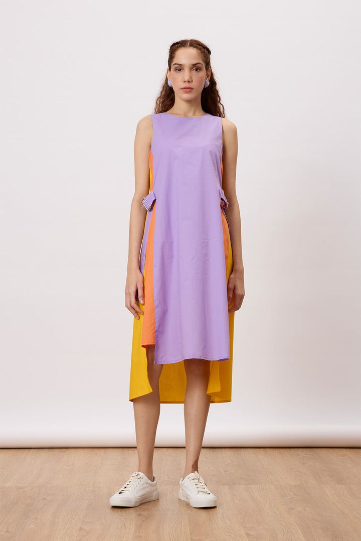 June Dress A relaxed, a-line dress with contrast panels and buckle belt detail at the sides