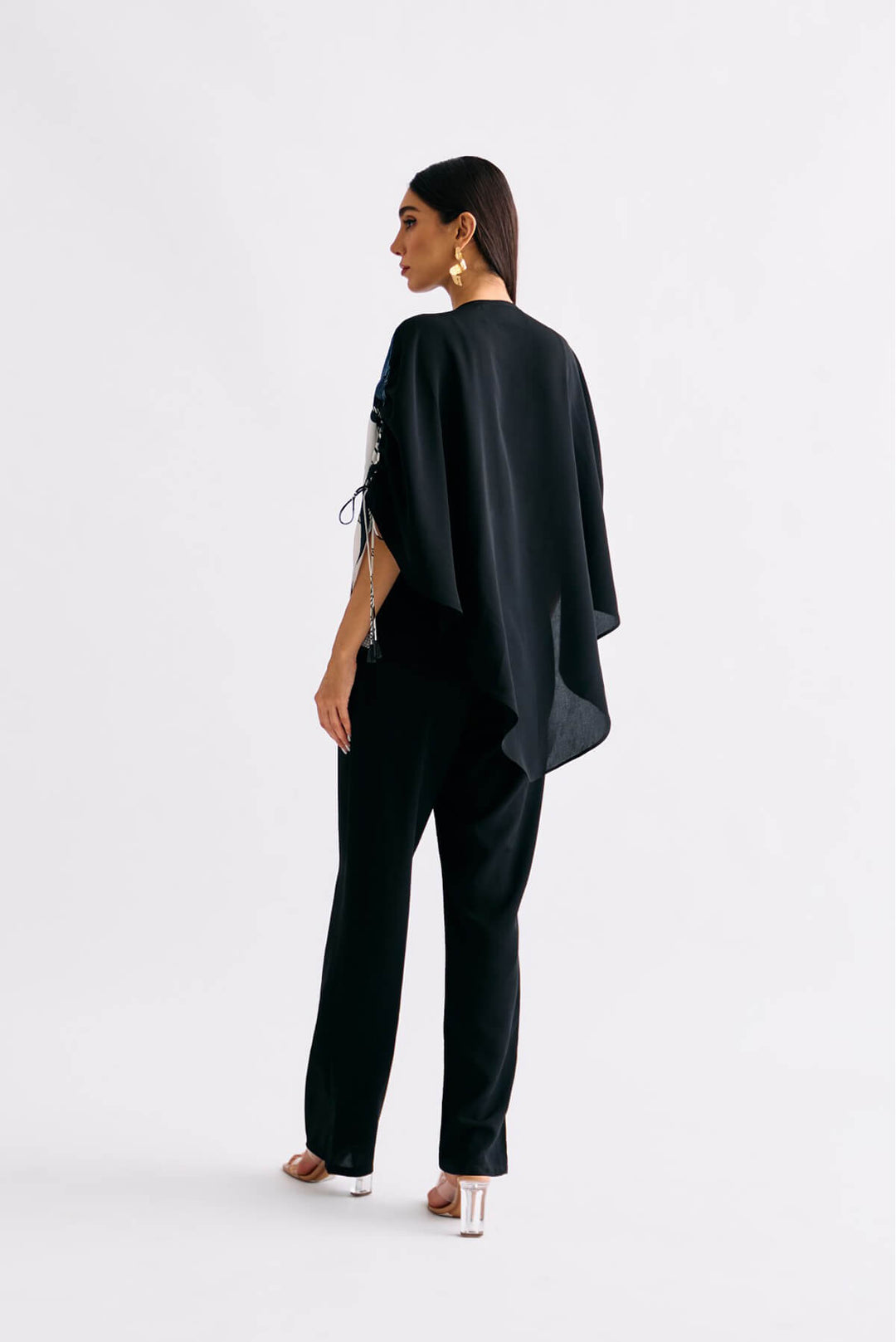 Kosey zip detailed cape top paired with slim fit pants